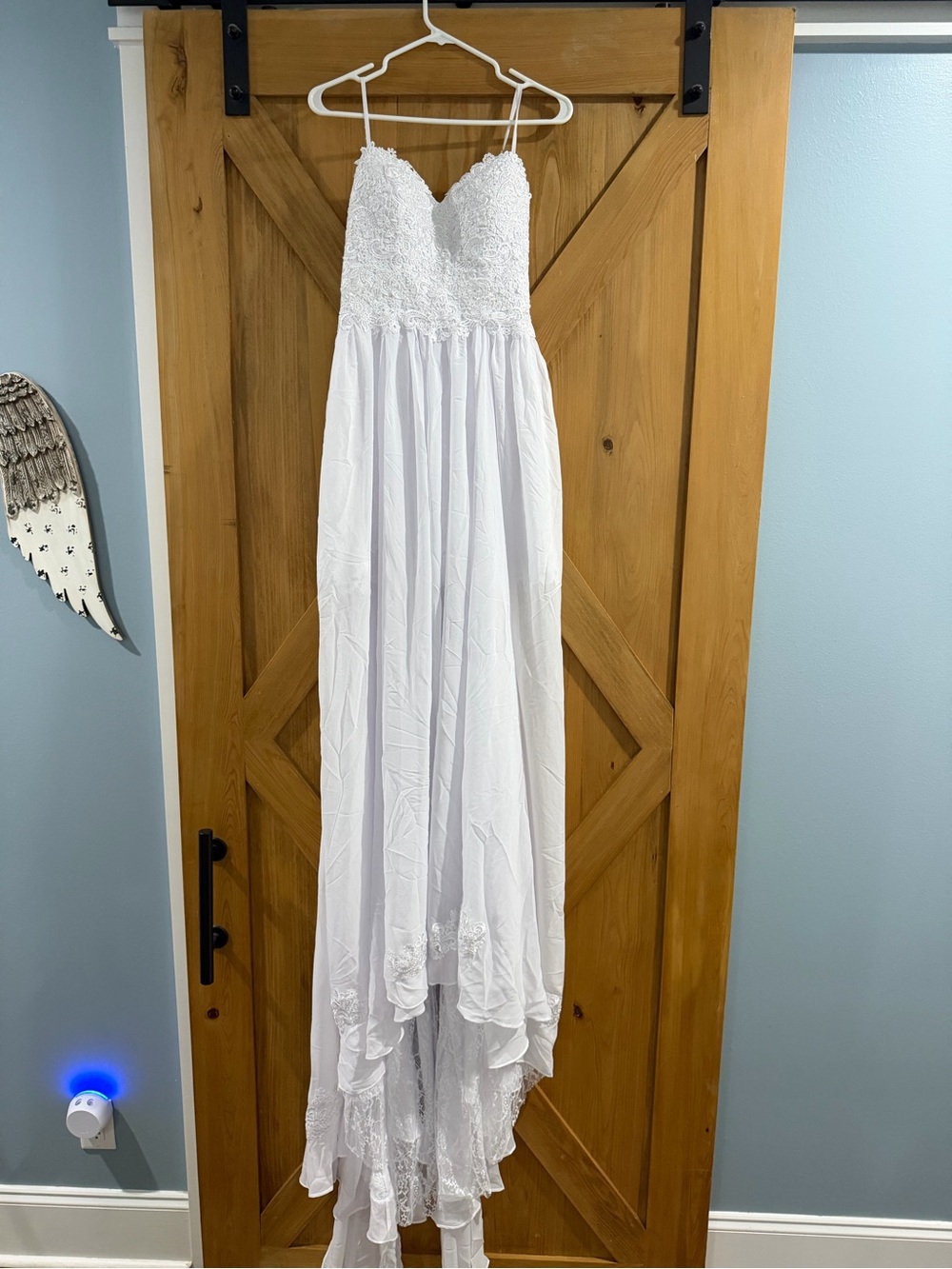 spaghetti strap chiffon gown with a high-low hem